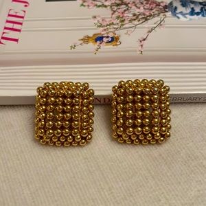 Vintage gold FO Inc. clip on earrings